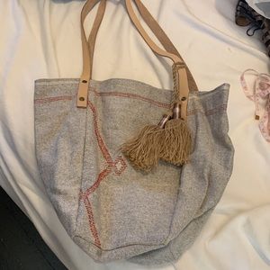 Mer Sea bag, NWOT, room, casual with 2 tassels. Never been used.
